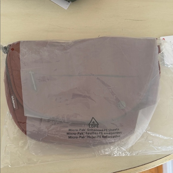 lululemon athletica Handbags - Lululemon Rust/ Burnt Orange Crossbody Bag - All Night Festival Bag  - NWT